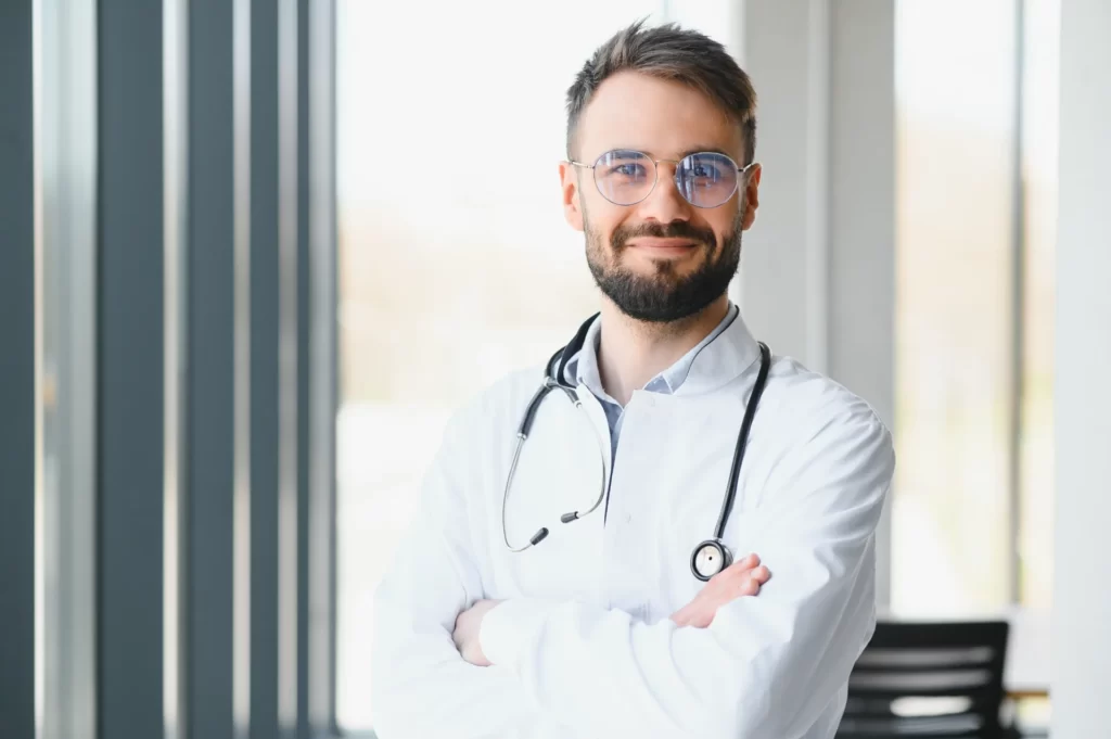 portrait of young male doctor with stethoscope cl utc