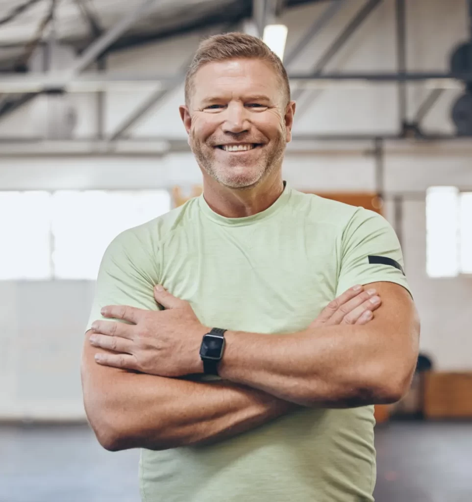 fitness sports and portrait of man in gym with cr utc
